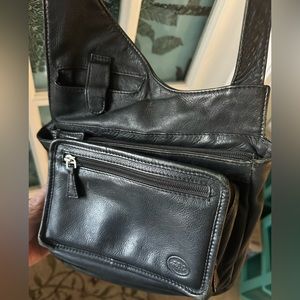 Leather  cross over shoulder bag. Great travel bag